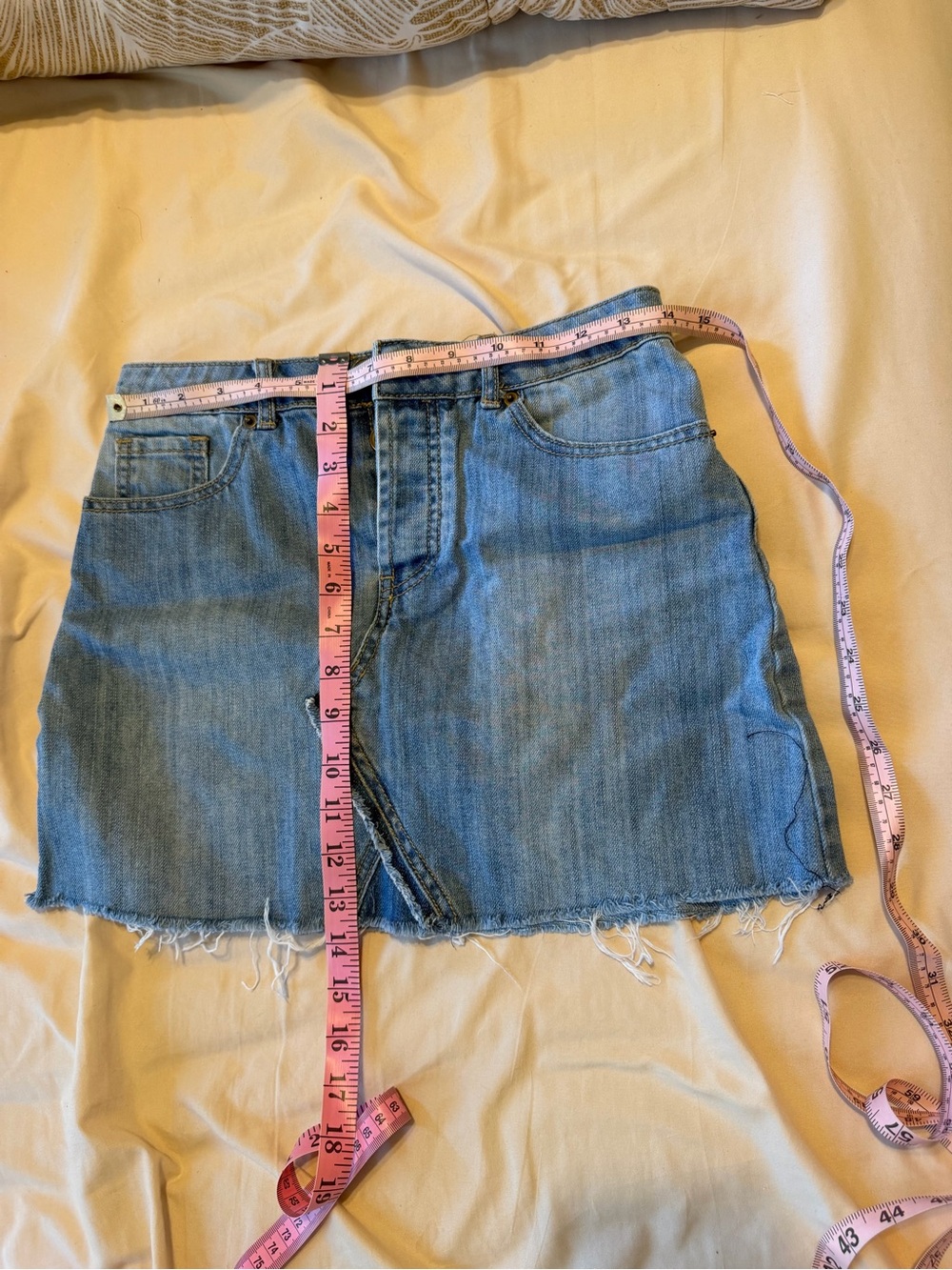 Light Blue Denim Mini Skirt with Raw Hem